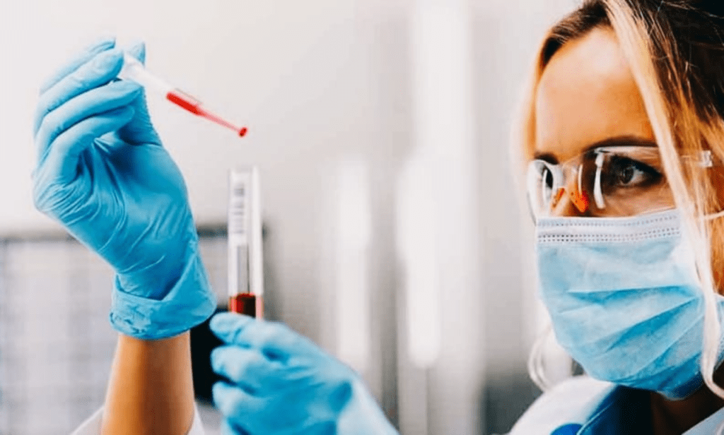 Blood test vial detecting early cancer through DNA analysis.