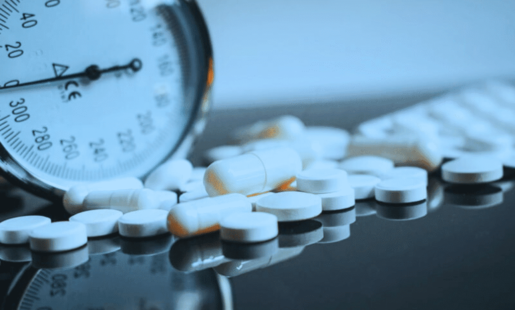 A recalled Prazosin bottle with a warning label about carcinogens.