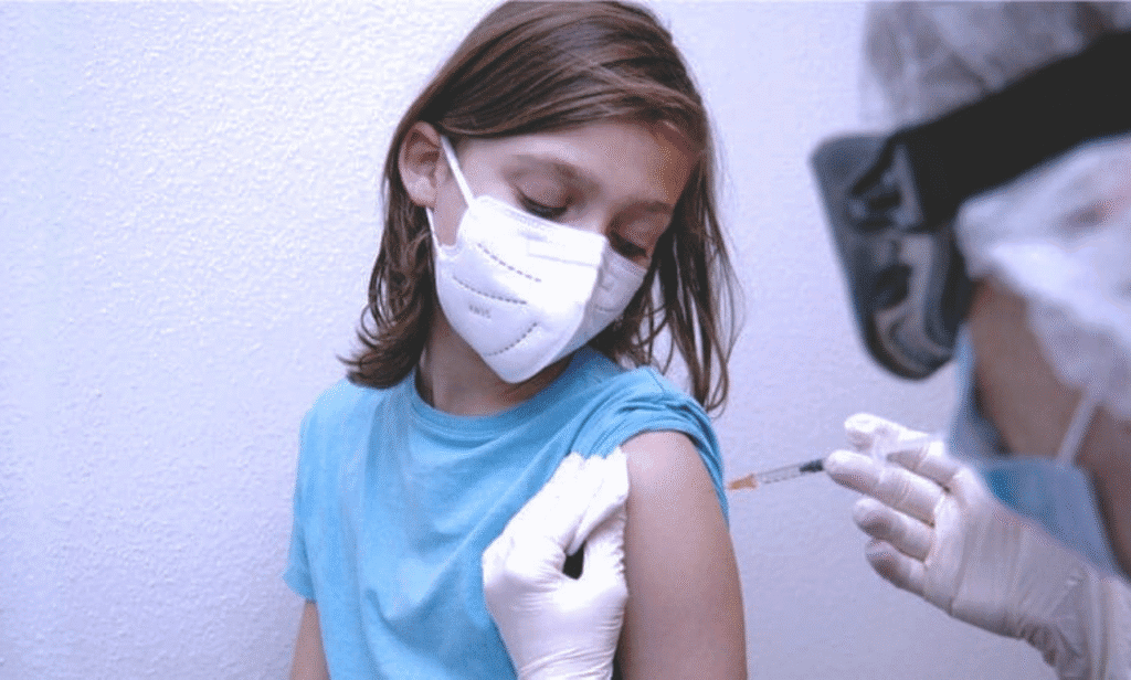A young girl showing fatigue from long COVID symptoms.
