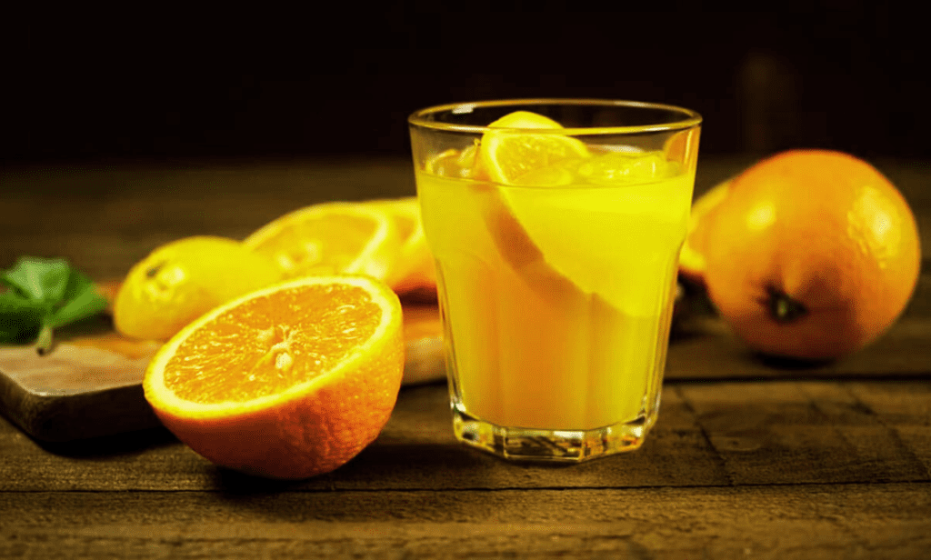 A glass of orange juice boosting morning health naturally
